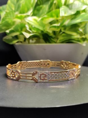Ornate Dual-Tone Flower Bangle