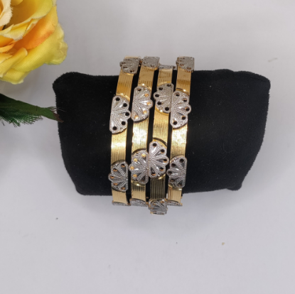 intricate gold bangle pattern