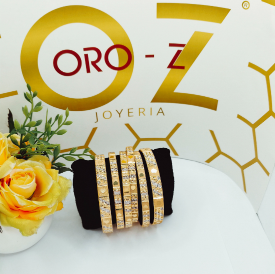 CNC-crafted gold bangles