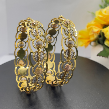 Laser Crafted Gold Bangles