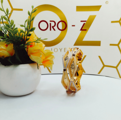 CNC laser cut gold bangles