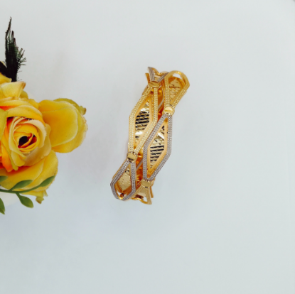 High polish 18K gold bangles