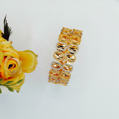 Elegant two tone gold bangle design