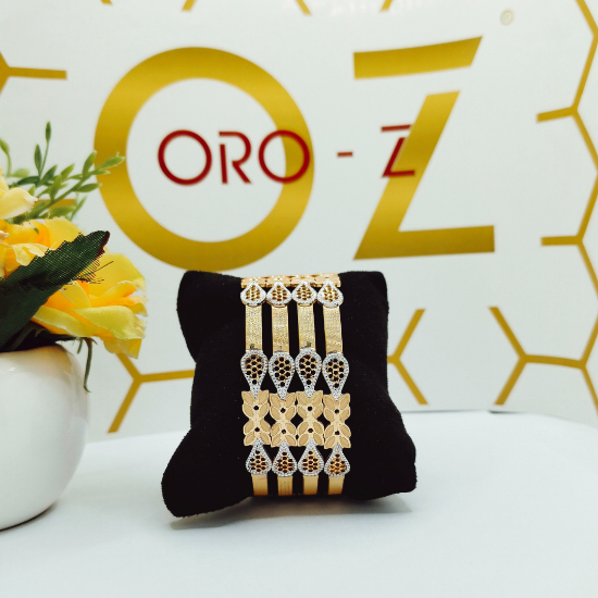 Precision cut gold bangles